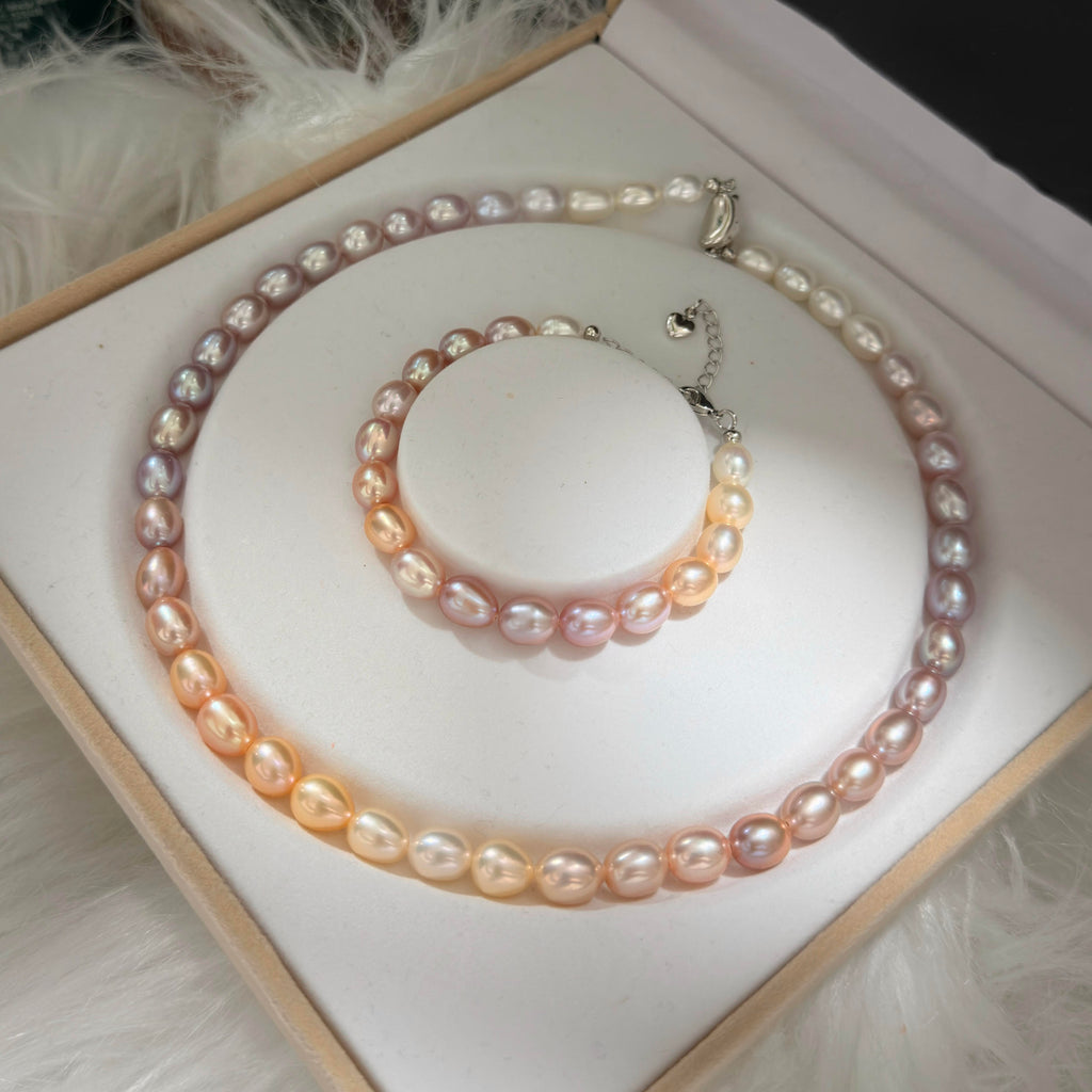 Close-up of oval freshwater pearls showing natural gradient colours and bright lustre.