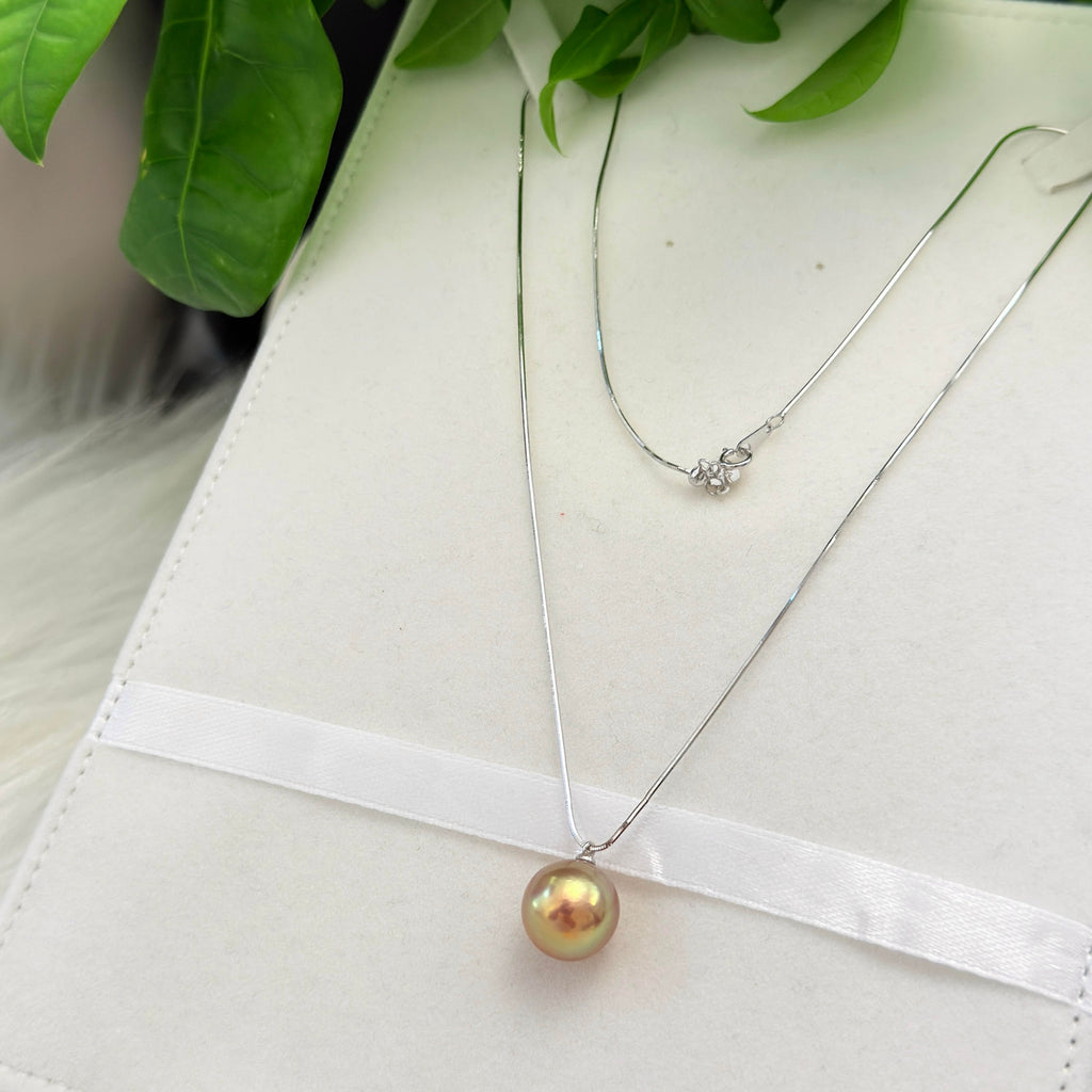 Sterling silver snake-bone chain necklace with a natural multicolor pearl.