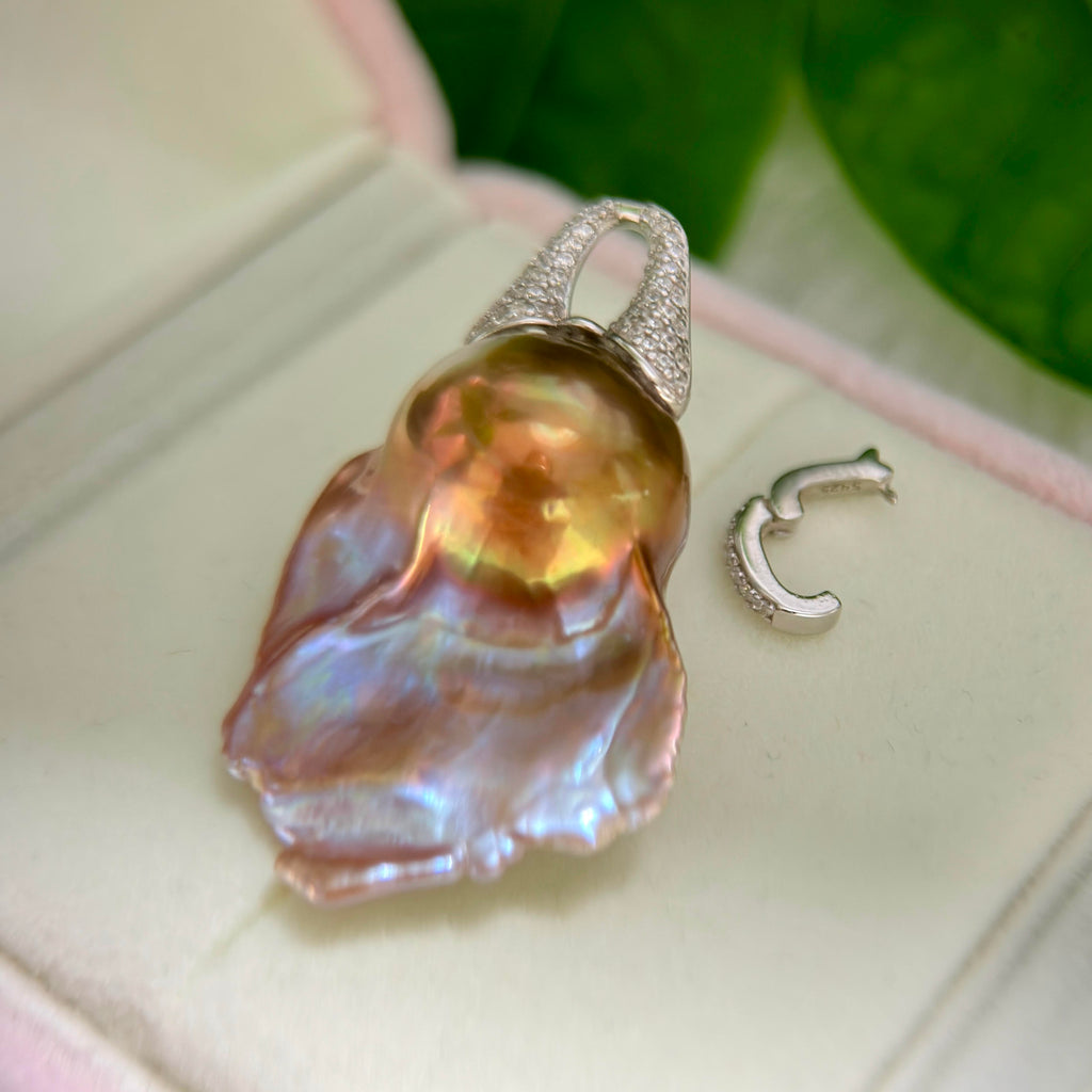 Multicolor baroque pearl pendant with a sterling silver detachable bail.