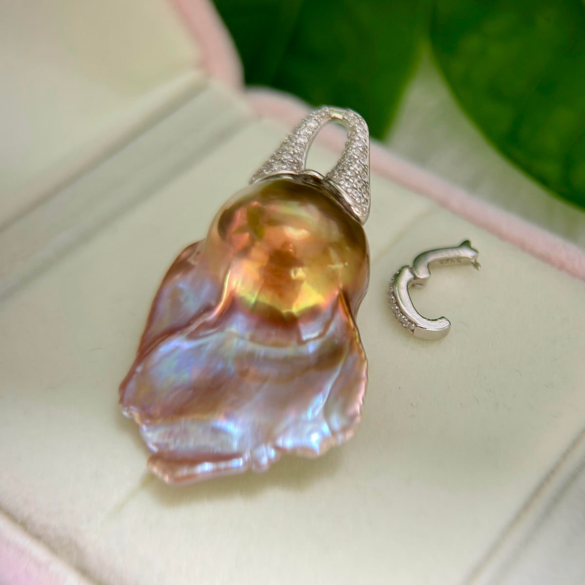 Multicolor baroque pearl pendant with a sterling silver detachable bail.