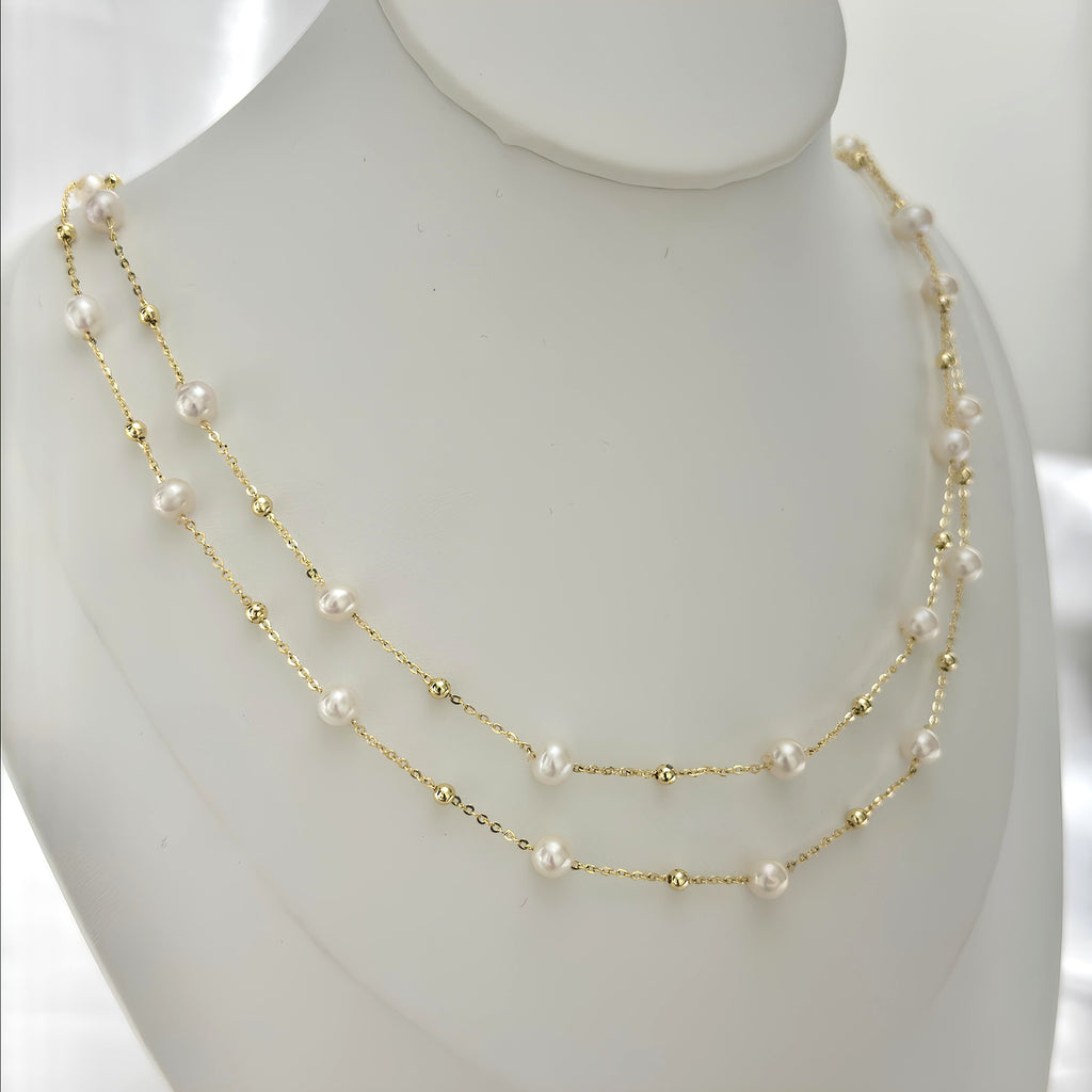 Natural 7 mm white pearl necklace with a graceful long silhouette.