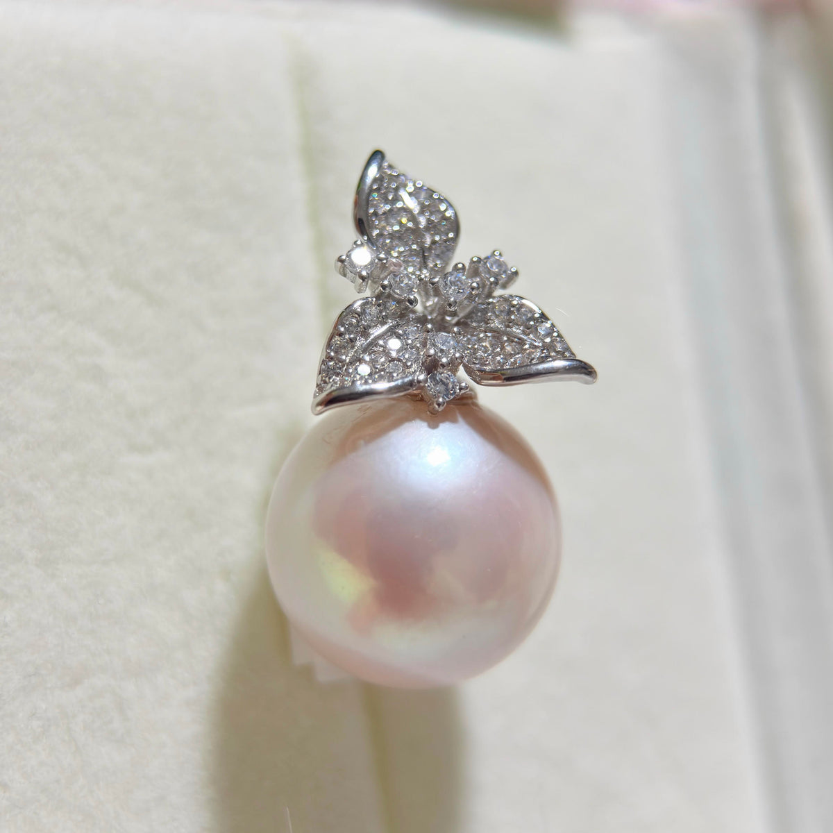 Sterling silver flower pearl necklace styled for a special occasion.