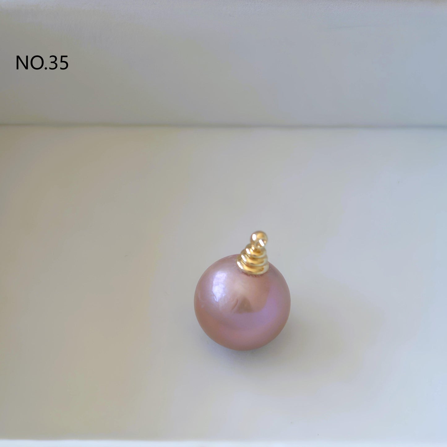 Light bulb natural pearl pendant