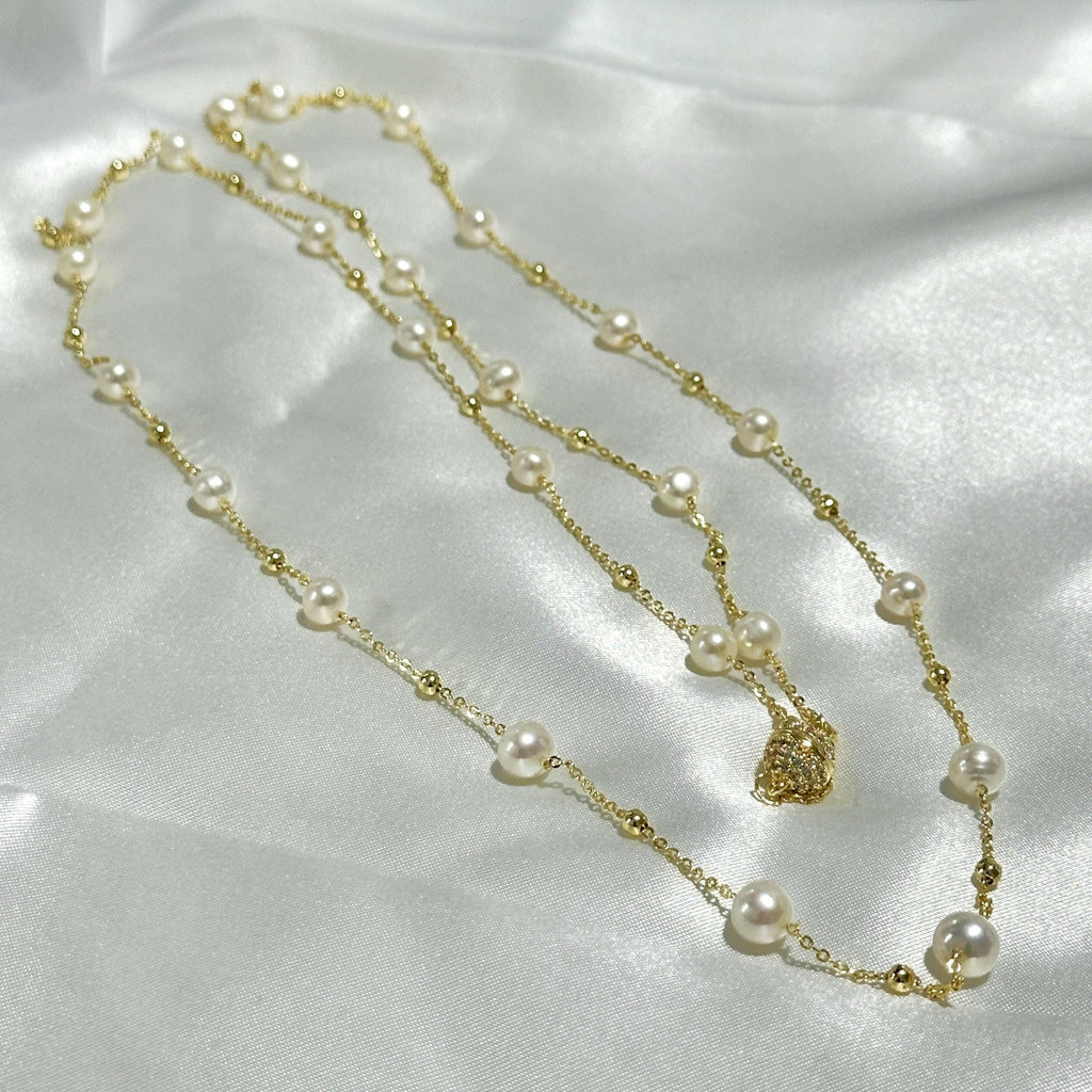 Romantic 95 cm long necklace featuring 7 mm natural white freshwater pearls.
