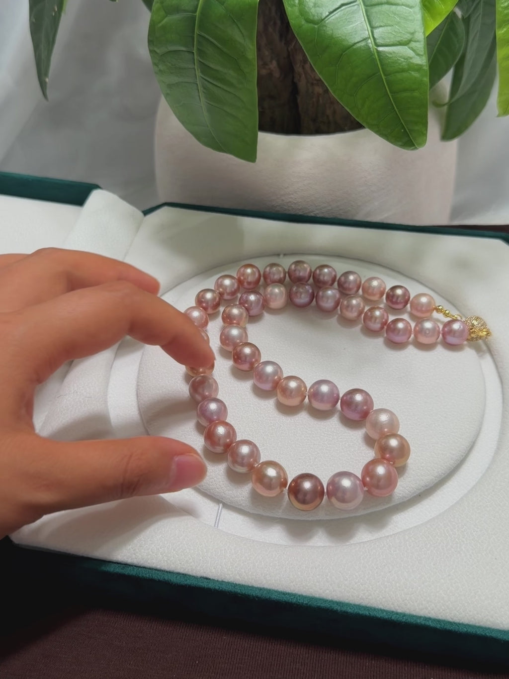 Multicolor freshwater pearl strand necklace finished with an easy magnetic clasp.
Pastel pearl necklace featuring pink peach lavender and creamy white freshwater pearls.
Large near-round freshwater pearls with naturally varied multicolor tones.