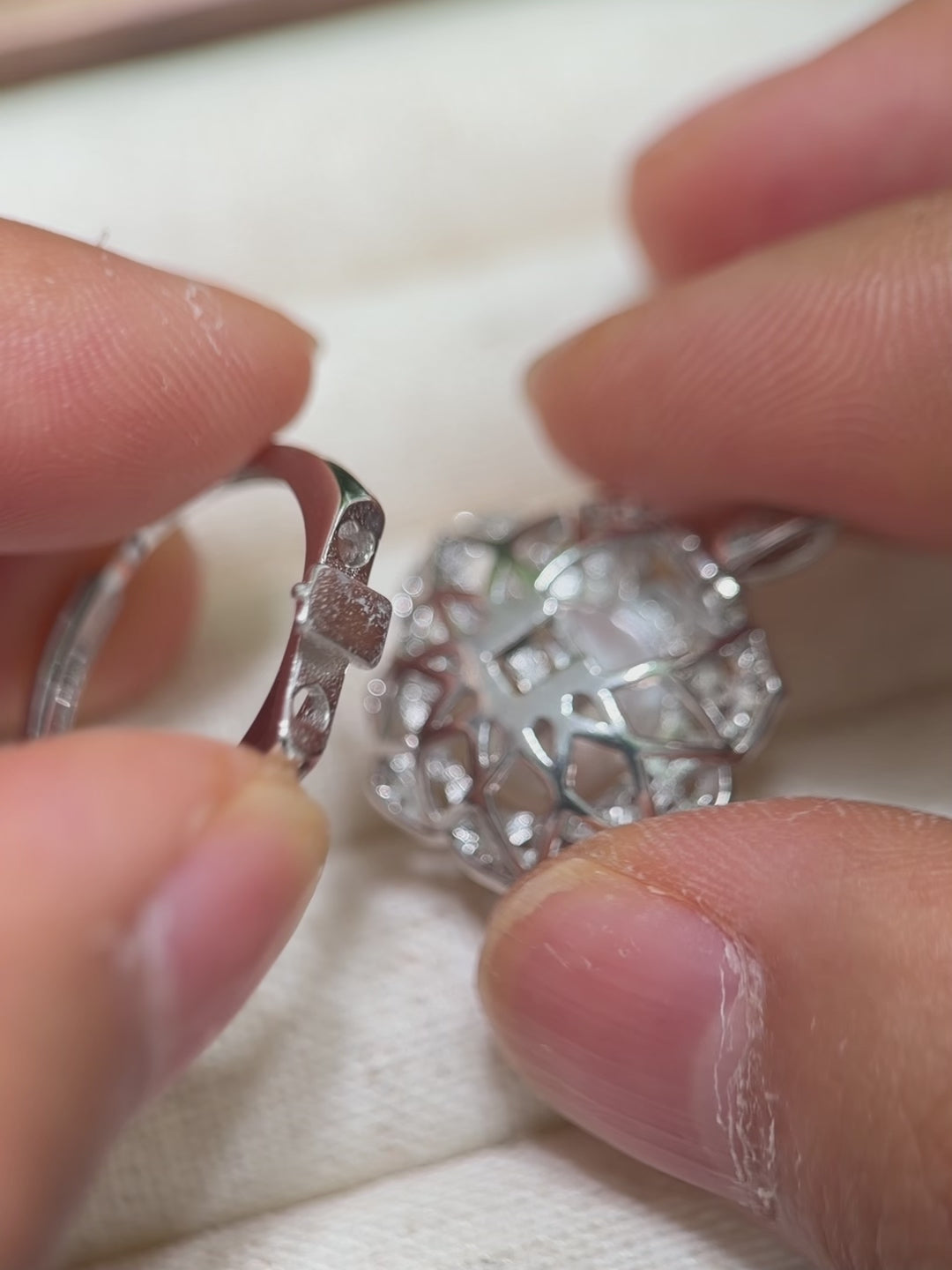Sparkling zirconia camellia ring with luminous natural freshwater pearl centre.
Convertible pearl flower design ready to be worn as an elegant pendant.