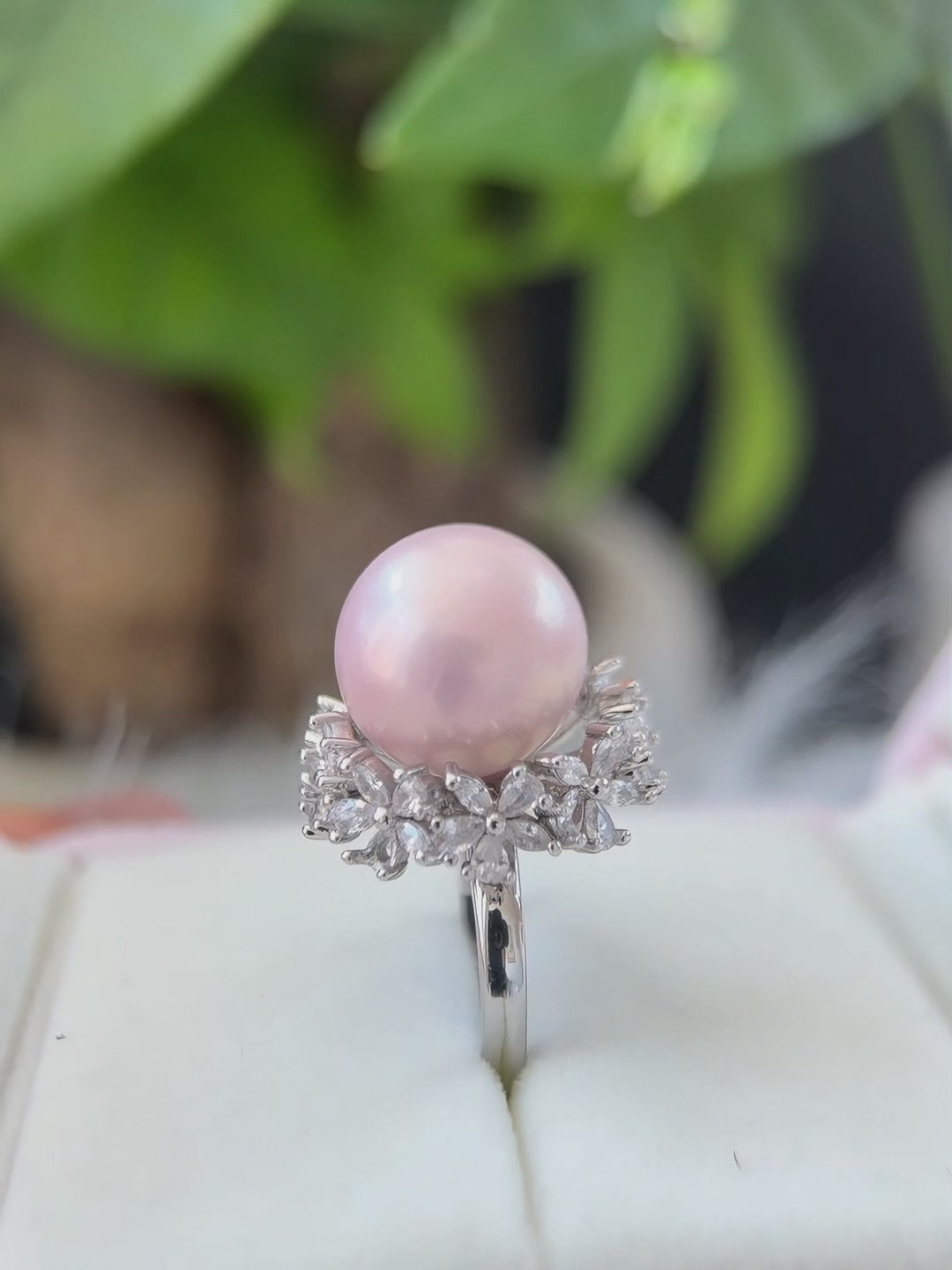 14.8 mm pink freshwater pearl floral halo ring. Large pink pearl ring with sparkling flower-style halo.
