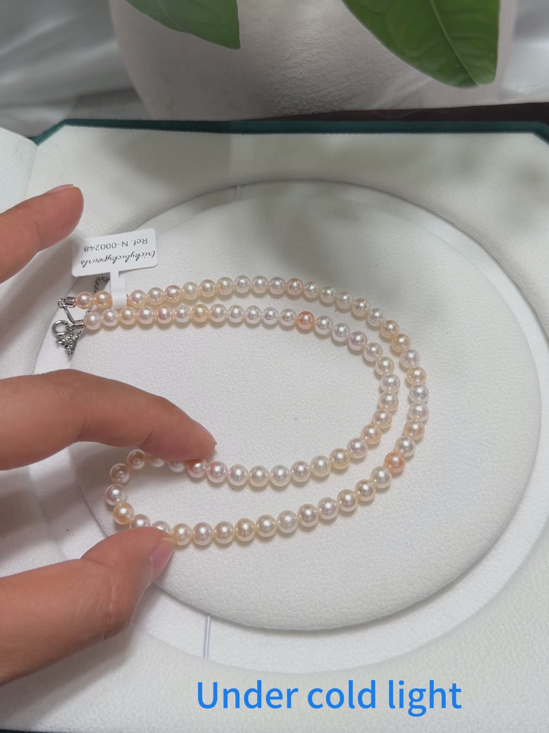 Freshwater pearl necklace showing natural colour and lustre variation.