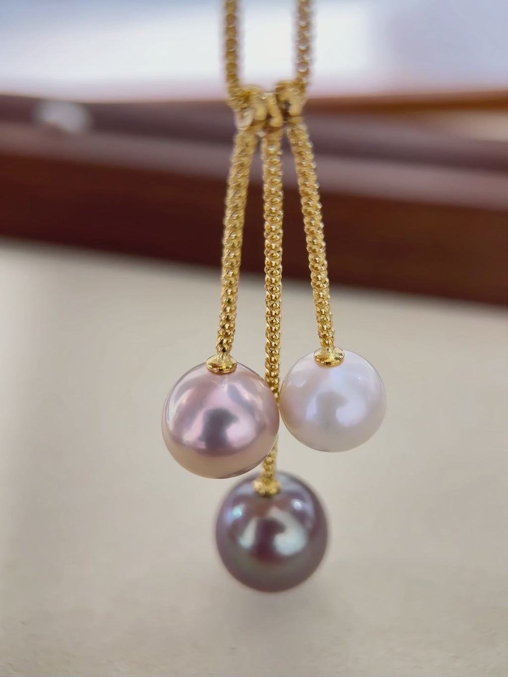 Three freshwater pearl necklace designed as a distinctive gift for her.
