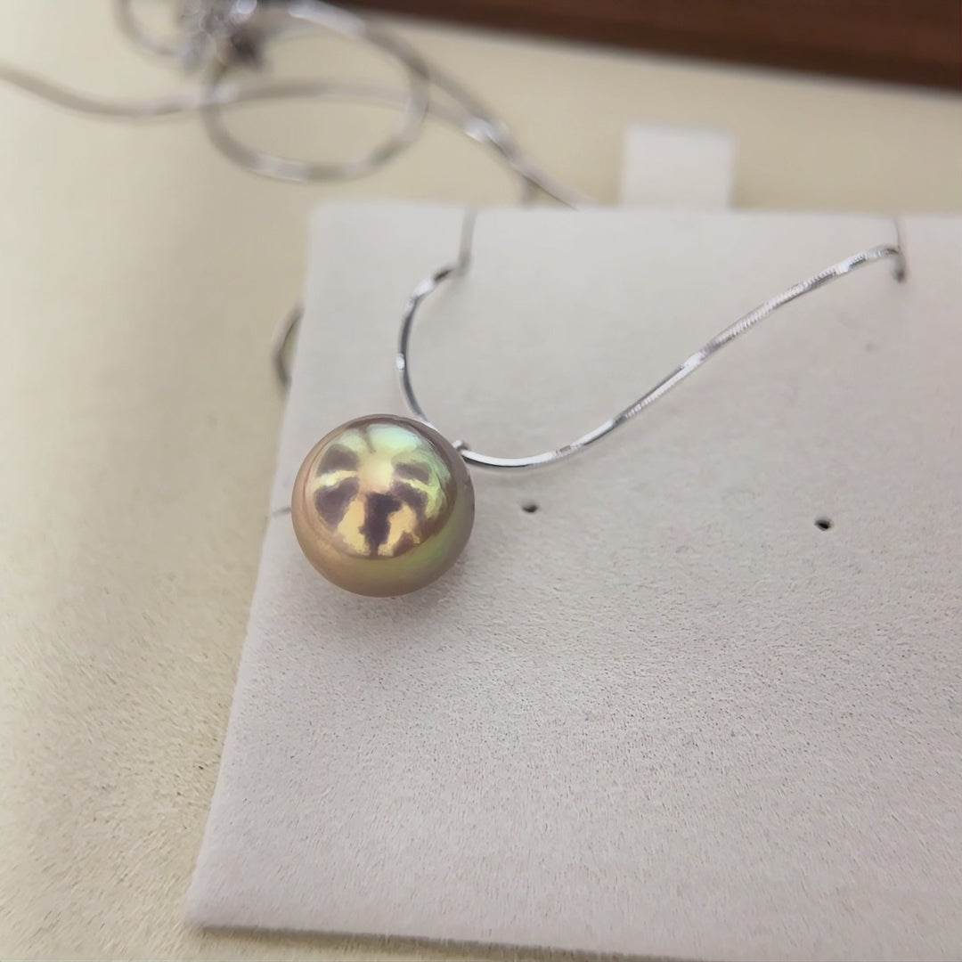 Multicolor freshwater pearl necklace styled for romantic evening wear.