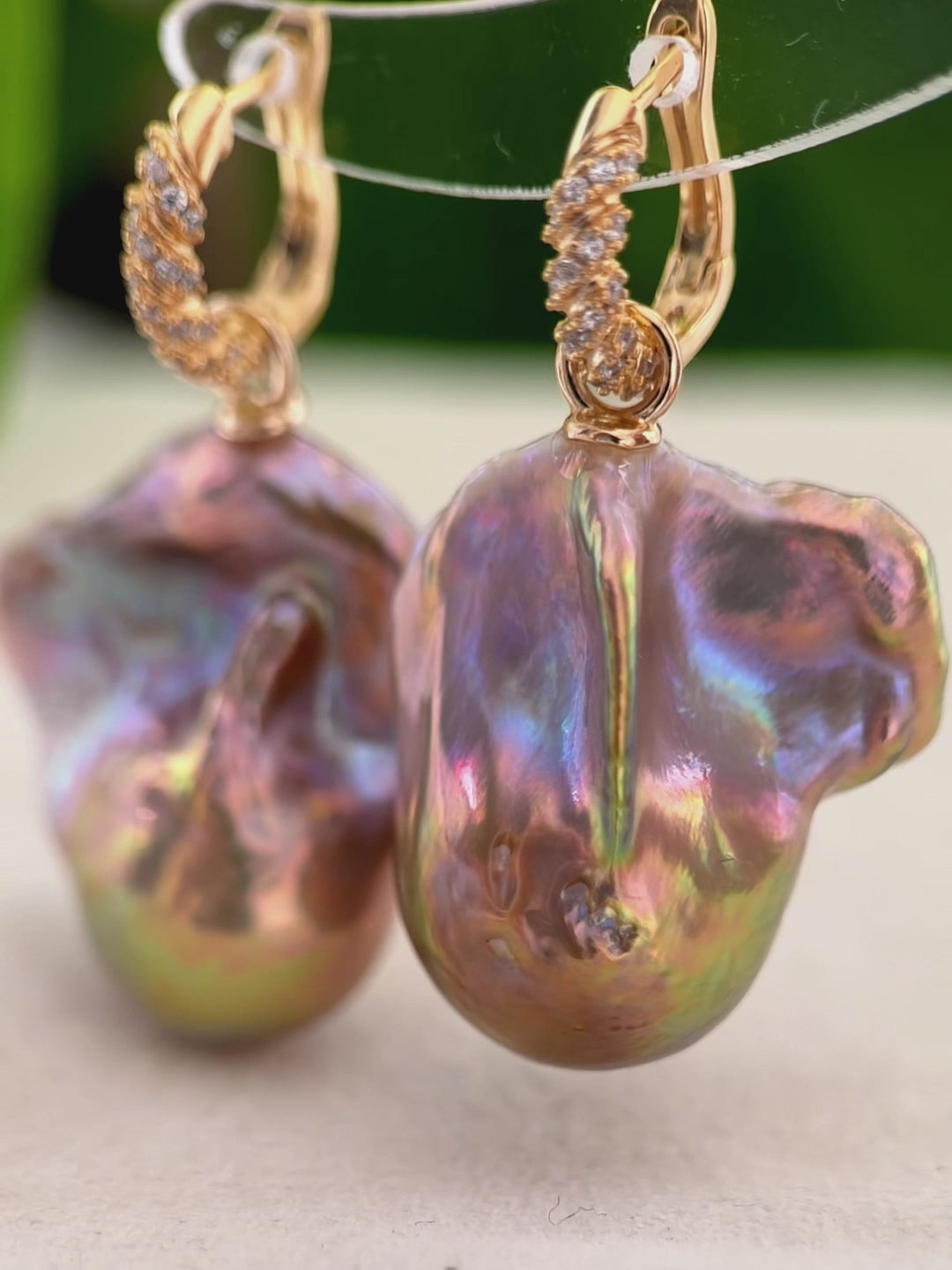 Golden-green baroque freshwater pearl earrings with detachable drops and gold-finish sterling silver hoops.
